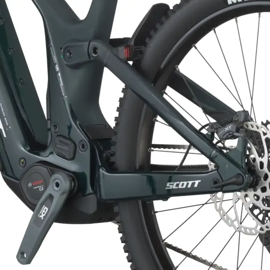 A Bicicleta Elétrica SCOTT Patron 900 tem Quadro em Carbono e Triângulo Alloy, Transmissão SRAM GX AXS 12 VL e Motor Bosch CX com bateria até 800Wh.