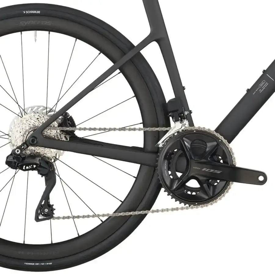 A Bicicleta SCOTT Addict 30 tem Quadro Addict RC em Carbono HMF e Transmissão Shimano 105 Di2 Disc 24 VL.