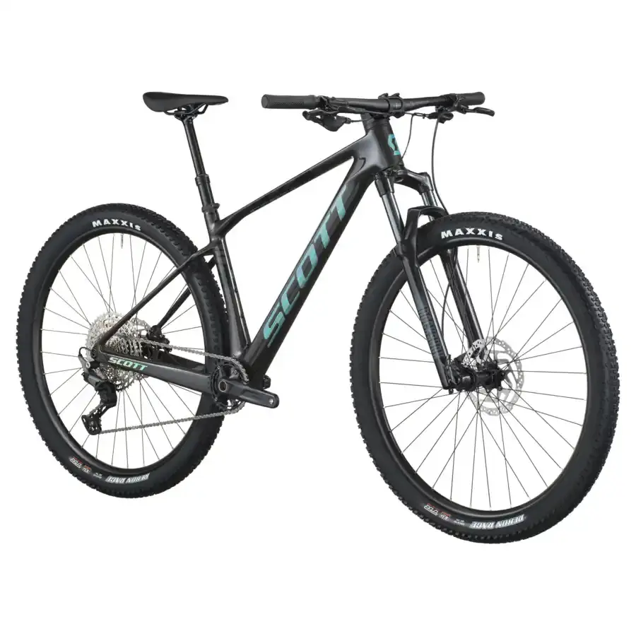 A Bicicleta SCOTT Scale 920 tem RockShox Judy Silver TK Solo Air, Quadro em Carbono HMF e transmissão Shimano Deore 12 VL.