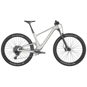 A Bicicleta SCOTT Spark 970 Silver tem Suspensão RockShox Judy, SRAM NX-SX Eagle de 12VL e Travões de Disco Shimano.+G530